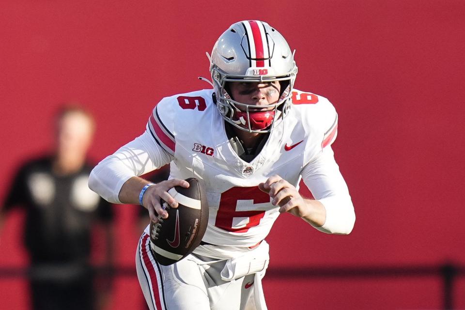 Ohio State's Kyle McCord was 20 for 33 passing for 239 yards against Indiana. He had one interception in the season opener without throwing a touchdown pass.