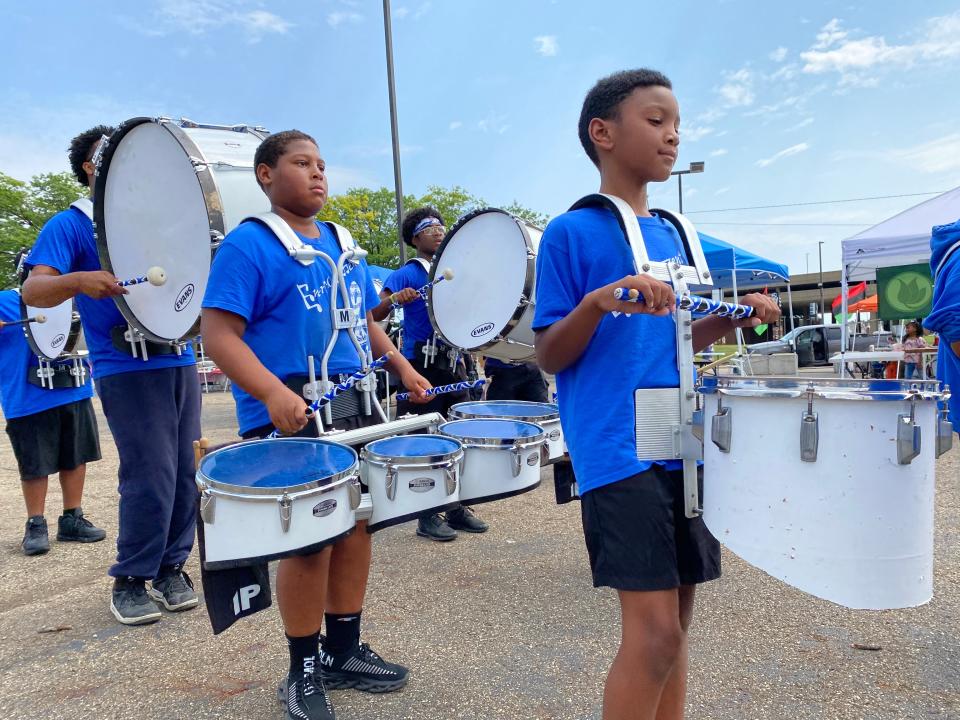 The EN-RICH-MENT Drumline is among the programs at the EN-RICH-MENT Fine Arts Academy in Canton. Betty Smith, who heads the agency, said working with children at EN-RICH-MENT has given her purpose following the loss of her husband to COVID last summer.