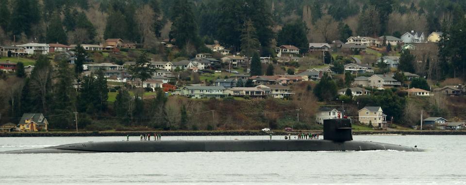 The USS Ohio passes Bremerton's Bachmann Park as it heads for Naval Base Kitsap-Bremerton on Monday.