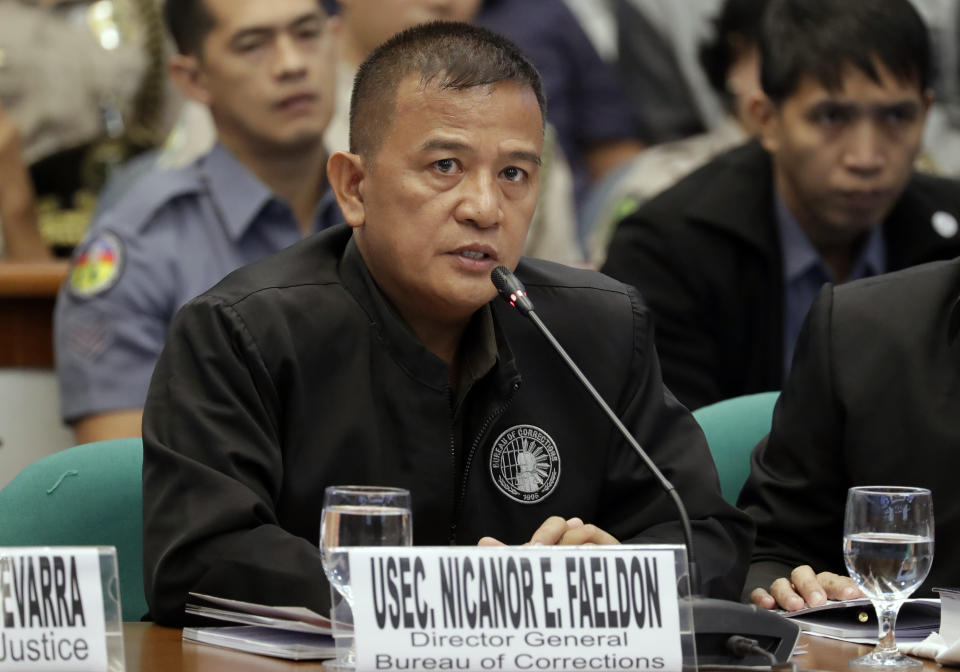 In this photo taken on Monday, Sept. 2, 2019, Nicanor Faeldon, the Director General of the Bureau of Corrections, testifies before the Senate Committee on Justice and Human Rights on his role in the failed release of former Mayor Antonio Sanchez, who was convicted in the rape and murders of two students in 1993, in suburban Pasay city south of Manila, Philippines. Philippine President Rodrigo Duterte has fired Faeldon Wednesday, Sept. 4, 2019 amid a public outcry over the release of hundreds of prisoners, including convicted rapists and drug traffickers, through a law rewarding good behavior in detention. (AP Photo/Bullit Marquez)