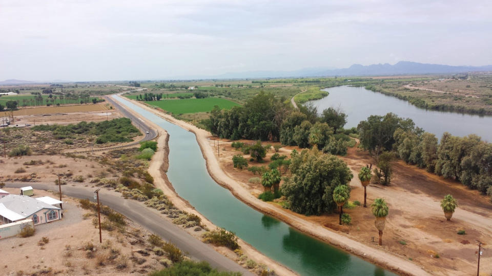 In this undated photo provided by Angie Ingram/CRIT Water Resources, a canal system on the Colorado River Indian Tribes (CRIT) reservation is seen near Parker, Ariz. The tribe has played an outsized role in Arizona to help keep Lake Mead from falling to drastically low levels. Still, Arizona is expected to face the first-ever mandatory cuts to its Colorado River water supply in 2022. (Angie Ingram/CRIT Water Resources via AP)