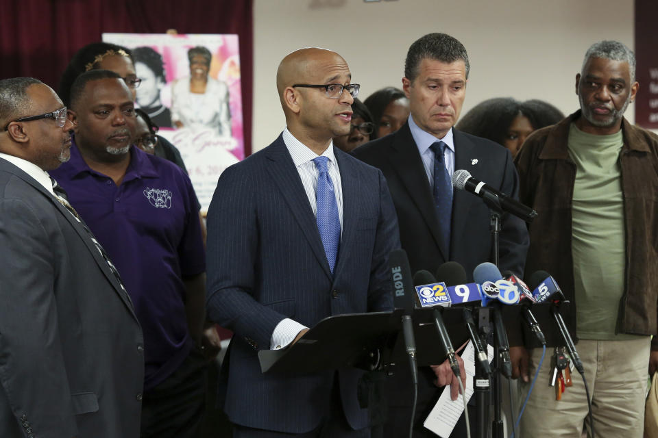 FILE - This June 11, 2019 file photo shows Dwight Gunn, center, son of Verona Gunn speaks during a press conference Tuesday, June 11, 2019, in Chicago. Verona Gunn was an 84-year-old woman killed last May when two Chicago Police vehicles slammed into a car she was riding in. Crashes involving Chicago police vehicles that killed Gunn and a young mother last week, highlight the dangers of police speeding to crime scenes or during car chases. Gunn's son says it's a police reform issue that's not getting the same attention as officers' use of excessive force. (AP Photo/Teresa Crawford File)