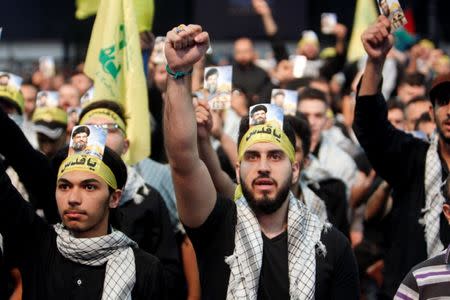 Supporters of Lebanon's Hezbollah leader Sayyed Hassan Nasrallah chant slogans and gesture during a rally marking Al-Quds day in Beirut's southern suburbs, Lebanon June 23, 2017. REUTERS/Aziz Taher