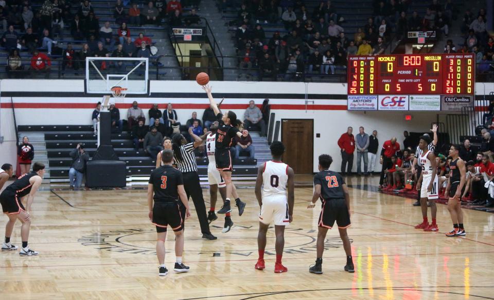McKinley and Massillon tip off a Division I sectional final in boys basketball at Canton Memorial Field House, Saturday, Feb. 29, 2020.