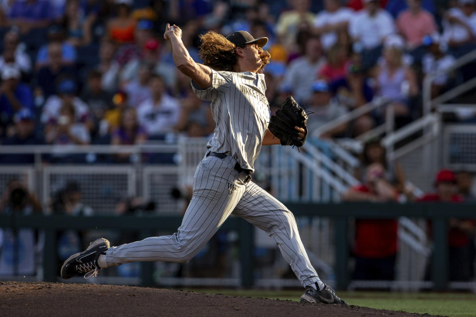 Wake Forest pitcher Rhett Lowder throws to an LSU batter during the fifth inning in a baseball game at the NCAA College World Series in Omaha, Neb., Thursday, June 22, 2023. (AP Photo/John Peterson)