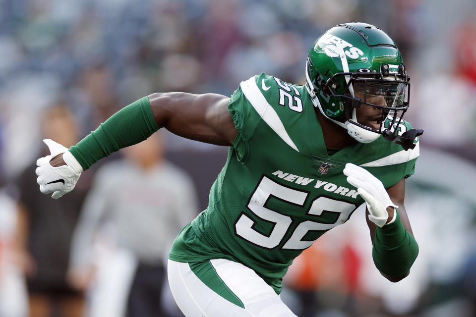 EAST RUTHERFORD, NEW JERSEY – AUGUST 19: Sam Eguavoen #52 of the New York Jets warms up before the first half of a preseason game against the Tampa Bay Buccaneers at MetLife Stadium on August 19, 2023 in East Rutherford, New Jersey. (Photo by Sarah Stier/Getty Images)