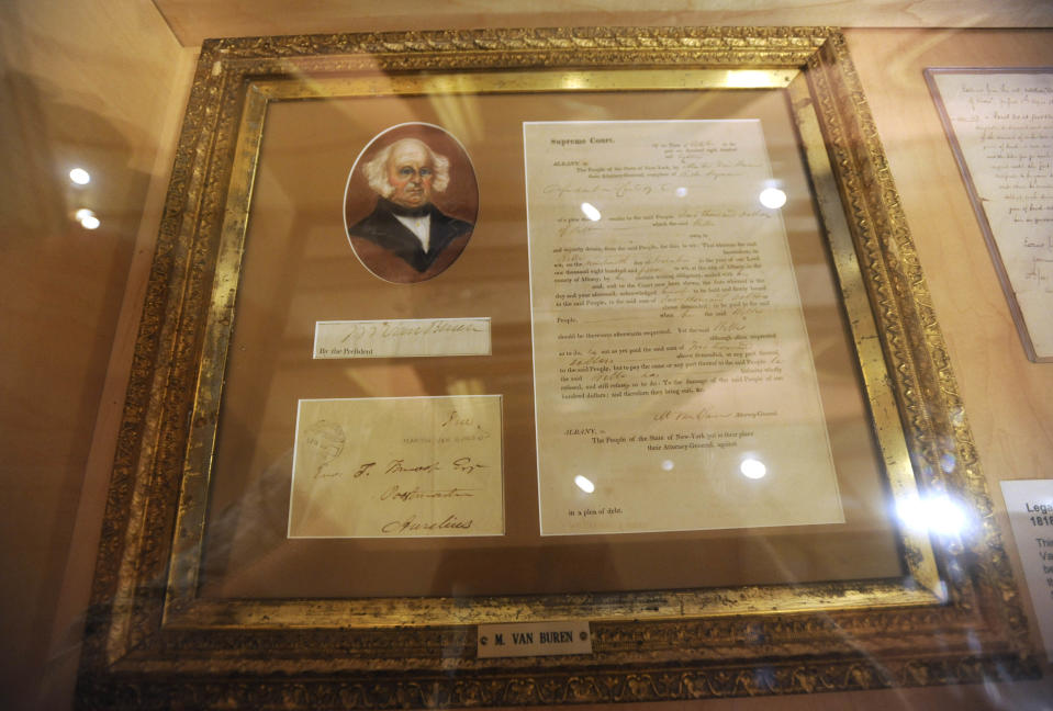 In this July 31, 2012 photo, documents from Martin Van Buren, when he served as New York attorney general, appear on display at the Capitol in Albany, N.Y. These documents are part of New York Gov. Andrew Cuomo's personal collection. (AP Photo/Tim Roske)