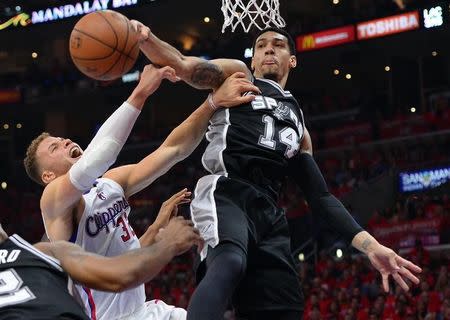 May 2, 2015; Los Angeles, CA, USA; San Antonio Spurs guard Danny Green (14) blocks a shot by Los Angeles Clippers forward Blake Griffin (32) in the first half of game seven of the first round of the NBA Playoffs at Staples Center. Mandatory Credit: Jayne Kamin-Oncea-USA TODAY Sports