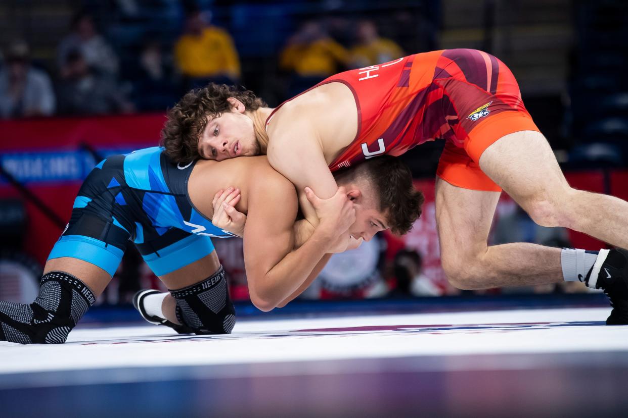 Levi Haines (top) wrestles his Penn State teammate Alex Facundo in a 74 kg preliminary bout during the U.S. Olympic Team Trials at the Bryce Jordan Center April 19, 2024, in State College. Facudno won by decision, 6-0.