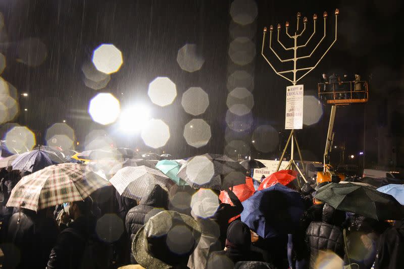 People gather at Grand Army Plaza in solidarity with the victims after an assailant stabbed five people attending a party at an Hasidic rabbi's home in Monsey, N.Y., on December 28, 2019, while they were celebrating Hanukkah in New York