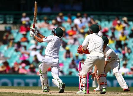 Cricket - Australia v Pakistan - Third Test cricket match - Sydney Cricket Ground, Sydney, Australia - 7/1/17 Pakistan's Younis Khan hits a shot and is caught out by Australia's Josh Hazlewood. REUTERS/David Gray