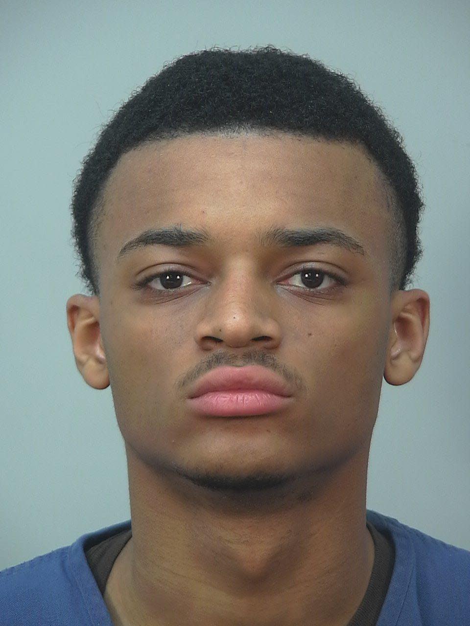 In this photo provided by the Dane County, Wisconsin Sheriff's Office, Khari Sanford is pictured in a booking photo dated April 3, 2020. Sanford has been booked into the Dane County Jail on two counts of party to the crime of first-degree intentional homicide, in the slayings of a University of Wisconsin physician and her husband. (AP/Dane County Sheriff's Office)