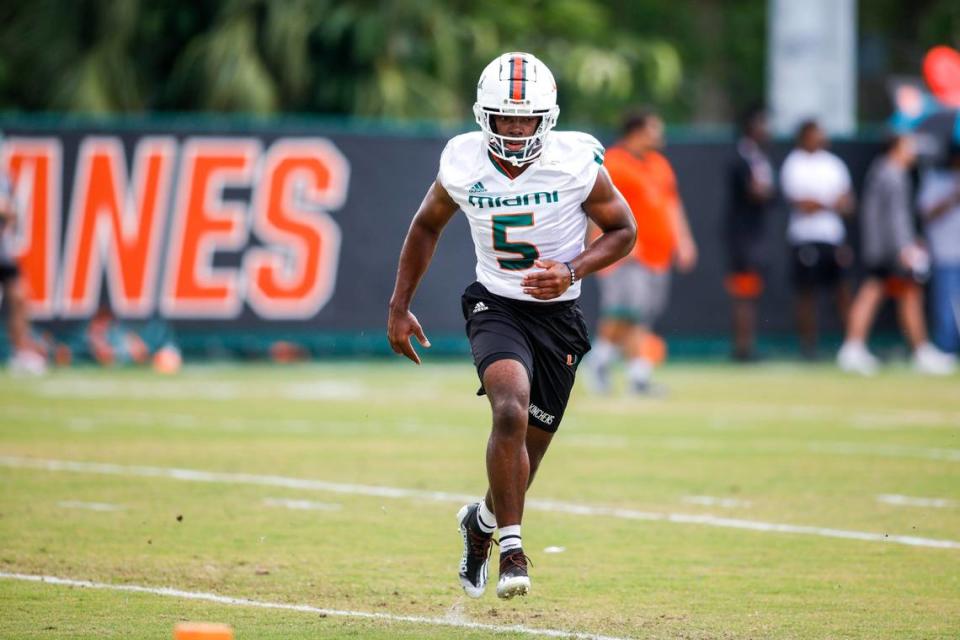 Miami Hurricanes defensive back Kamren Kinchens (5) runs on the field during spring practice at the University of Miami in Coral Gables, Florida, Saturday, March 4, 2023.  