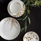 <p><strong>Vera Wang for Wedgwood</strong></p><p>bloomingdales.com</p><p><strong>$160.00</strong></p><p><a href="https://go.redirectingat.com?id=74968X1596630&url=https%3A%2F%2Fwww.bloomingdales.com%2Fshop%2Fproduct%2Fvera-wang-wedgwood-vera-jardin-4-piece-place-setting%3FID%3D2894209&sref=https%3A%2F%2Fwww.housebeautiful.com%2Fentertaining%2Fholidays-celebrations%2Fg22778748%2Fthanksgiving-dinnerware%2F" rel="nofollow noopener" target="_blank" data-ylk="slk:Shop Now;elm:context_link;itc:0;sec:content-canvas" class="link ">Shop Now</a></p><p>Keep it simple, delicate, and formal with this white dinnerware set adorned with gold foil botanical prints. </p>