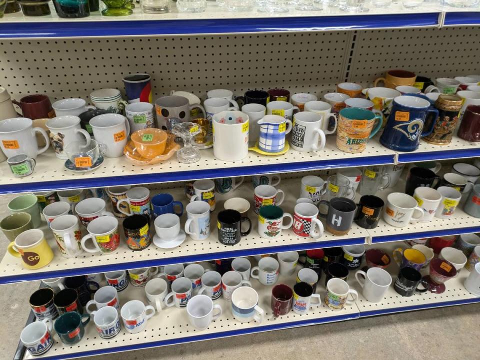 There’s no shortage of coffee mugs at the St. Vincent de Paul Thrift Store in Fairview Heights.