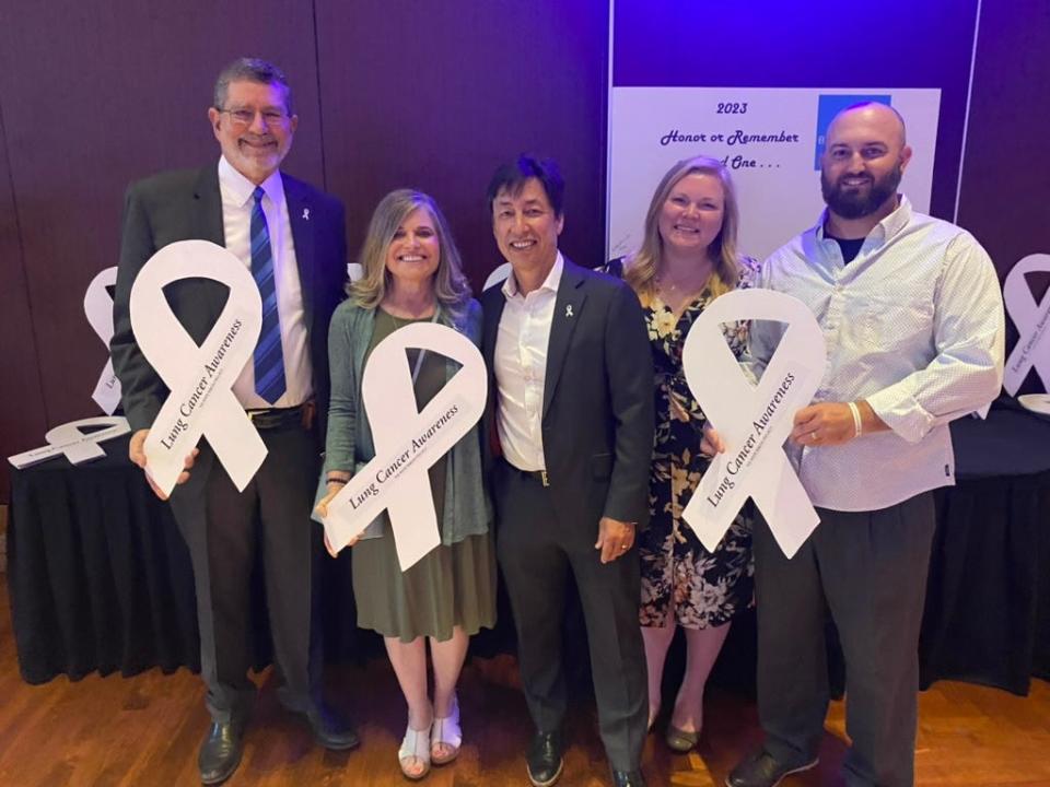 Dr. David Carbone, far left, shown with founders of the White Ribbon Project, lung cancer survivors and caregivers, is the featured speaker at Breath of Ohio’s annual gala on Saturday.