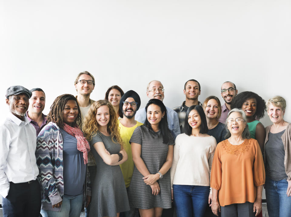 Diverse group of people standing together.