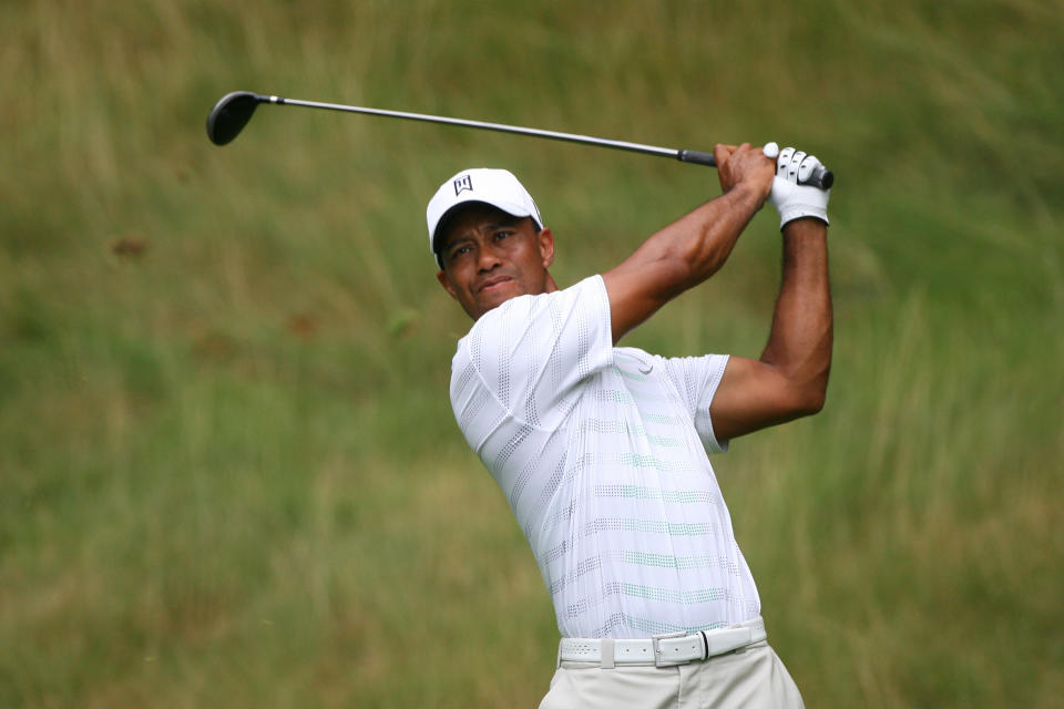 Tiger Woods hits his tee shot on the sixth hole during the first round of the Greenbrier Classic at the Old White TPC on July 5, 2012 in White Sulphur Springs, West Virginia. (Photo by Hunter Martin/Getty Images)