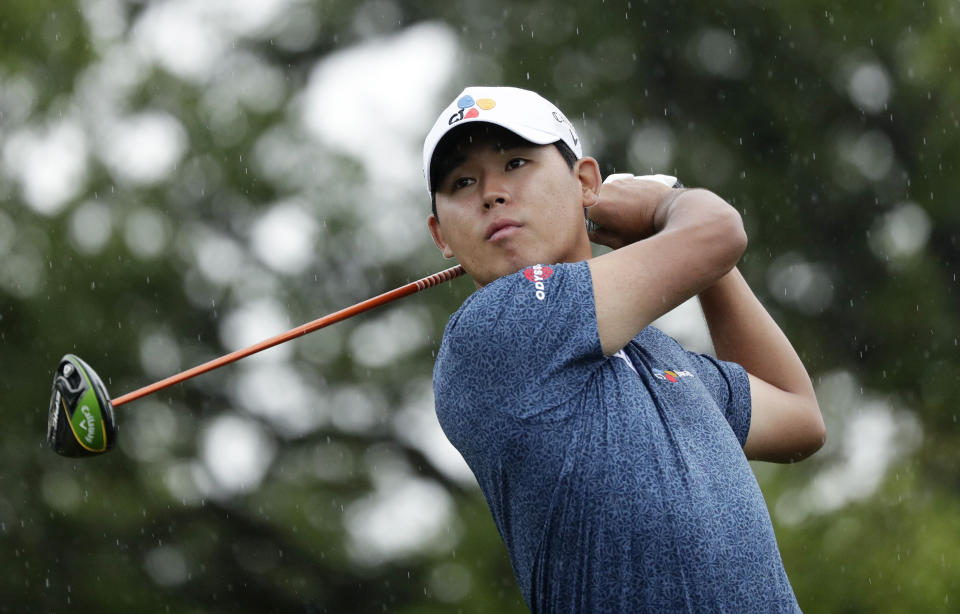 Si Woo Kim watches his drive on the second hole during the third round of the Texas Open golf tournament, Saturday, April 6, 2019, in San Antonio. (AP Photo/Eric Gay)