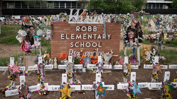 PHOTO: Crosses set up to honor those who lost their lives during the Robb Elementary School shooting in Uvalde, Texas, Nov. 8, 2022. (Mark Felix/AFP via Getty Images)
