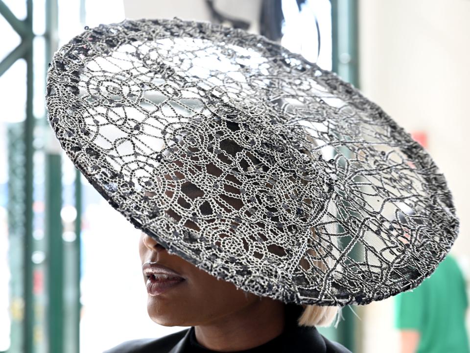 Silver and black sequin hat at the 2023 Kentucky Derby.