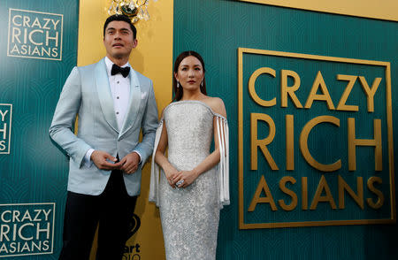 Cast members Henry Golding and Constance Wu pose at the premiere for "Crazy Rich Asians" in Los Angeles, California, U.S., August 7, 2018. REUTERS/Mario Anzuoni