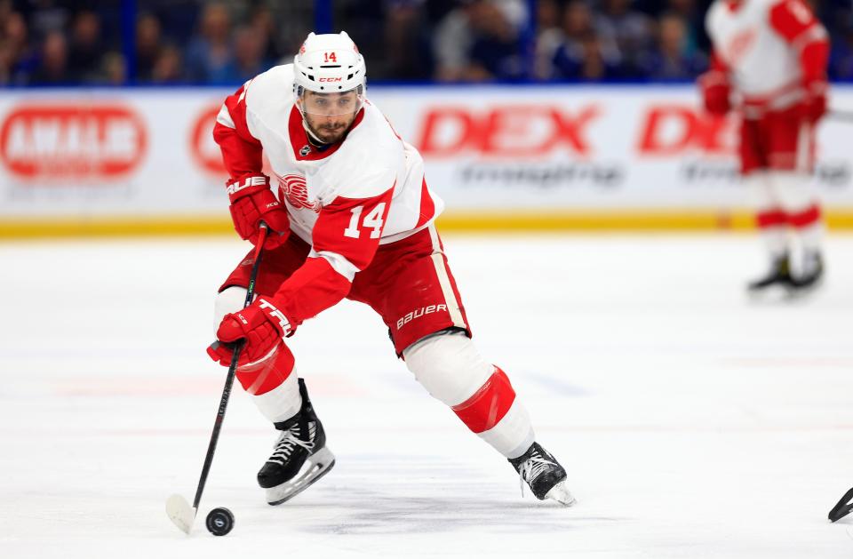 Robby Fabbri (14) of the Detroit Red Wings looks to pass during a game against the Tampa Bay Lightning at Amalie Arena on March 4, 2022 in Tampa, Florida.