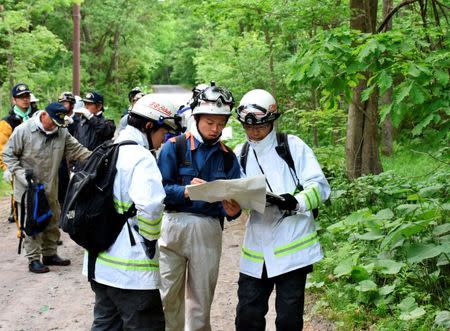 People search for a seven-year-old boy who went missing two days earlier, in Nanae town on the northernmost Japanese main island of Hokkaido, Japan, in this photo taken by May 30, 2016. Mandatory credit Kyodo/via REUTERS