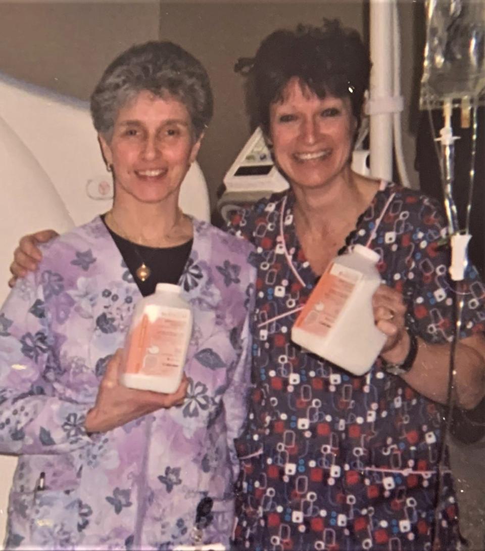 Denise Dinn, left, with Andrea Thornley at South Shore Hospital. The two radiologic technologists worked together for more than 40 years.