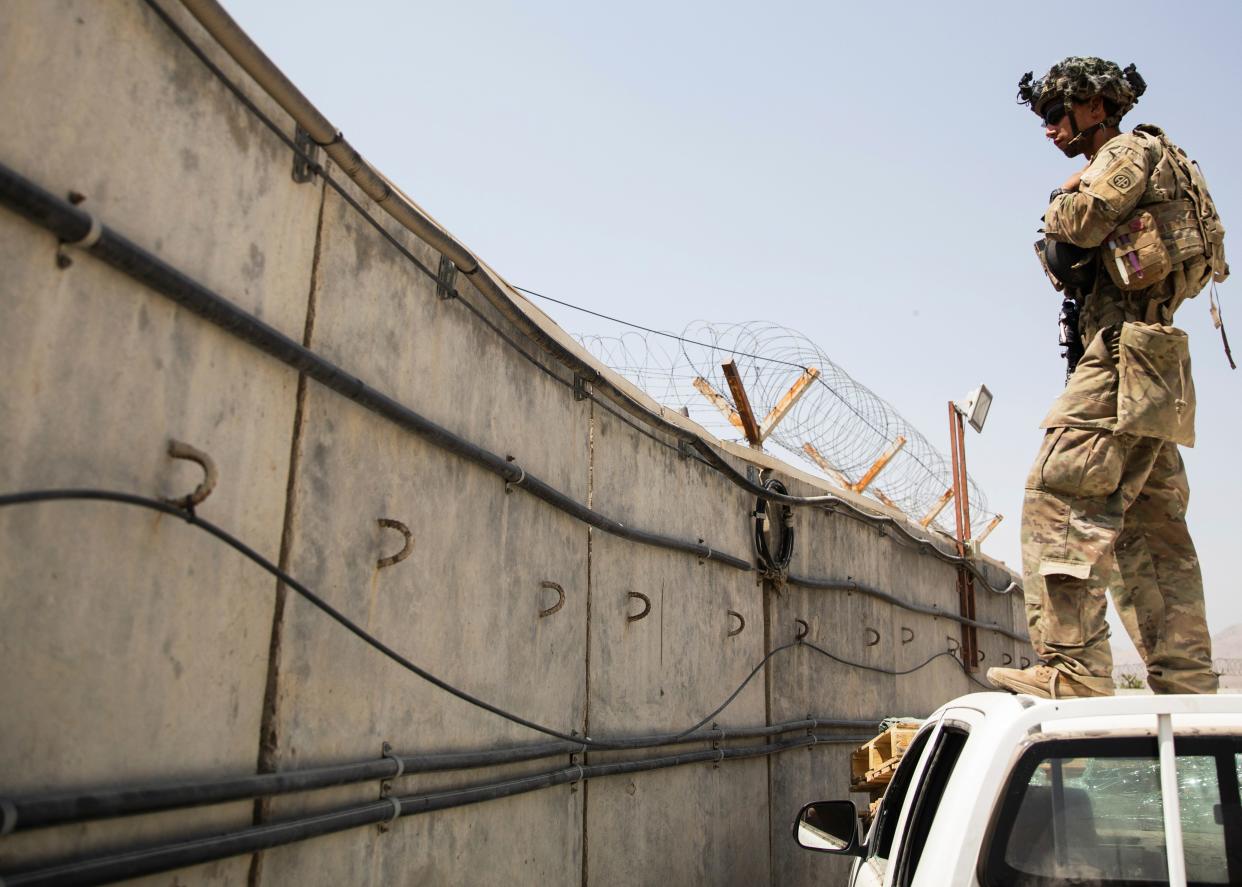 A paratrooper from the 82nd Airborne Division conducts security at Hamid Karzai International Airport in Kabul, Afghanistan, on Aug. 28, 2021.