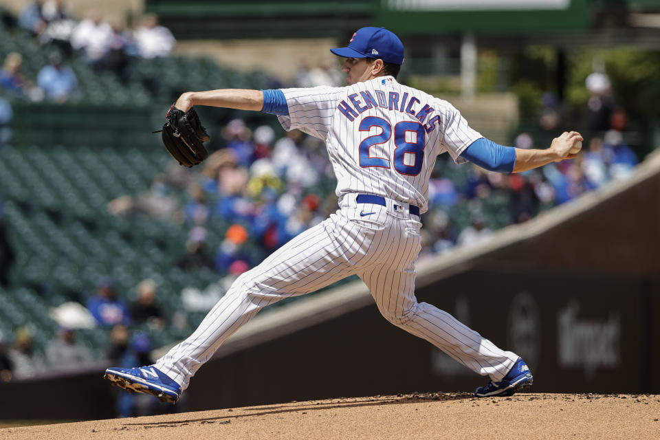 Chicago Cubs starting pitcher Kyle Hendricks (28) delivers against the Pittsburgh Pirates during the first inning of a baseball game, Sunday, May 9, 2021, in Chicago. (AP Photo/Kamil Krzaczynski)