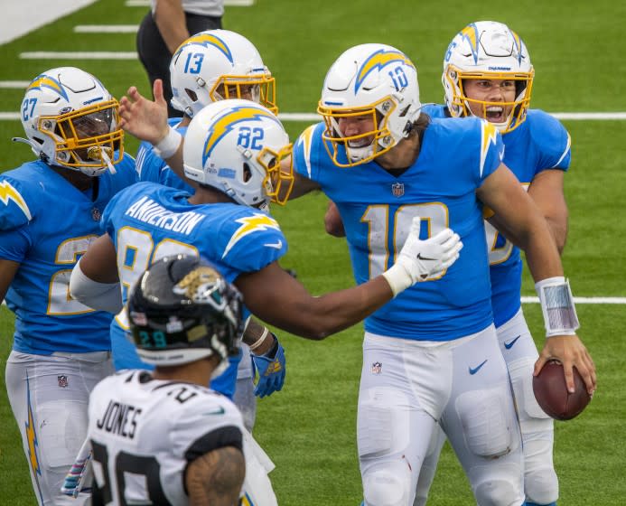 INGLEWOOD, CA - OCTOBER 25: Jaguars' safety Josh Jones, left, watches Chargers quarterback.