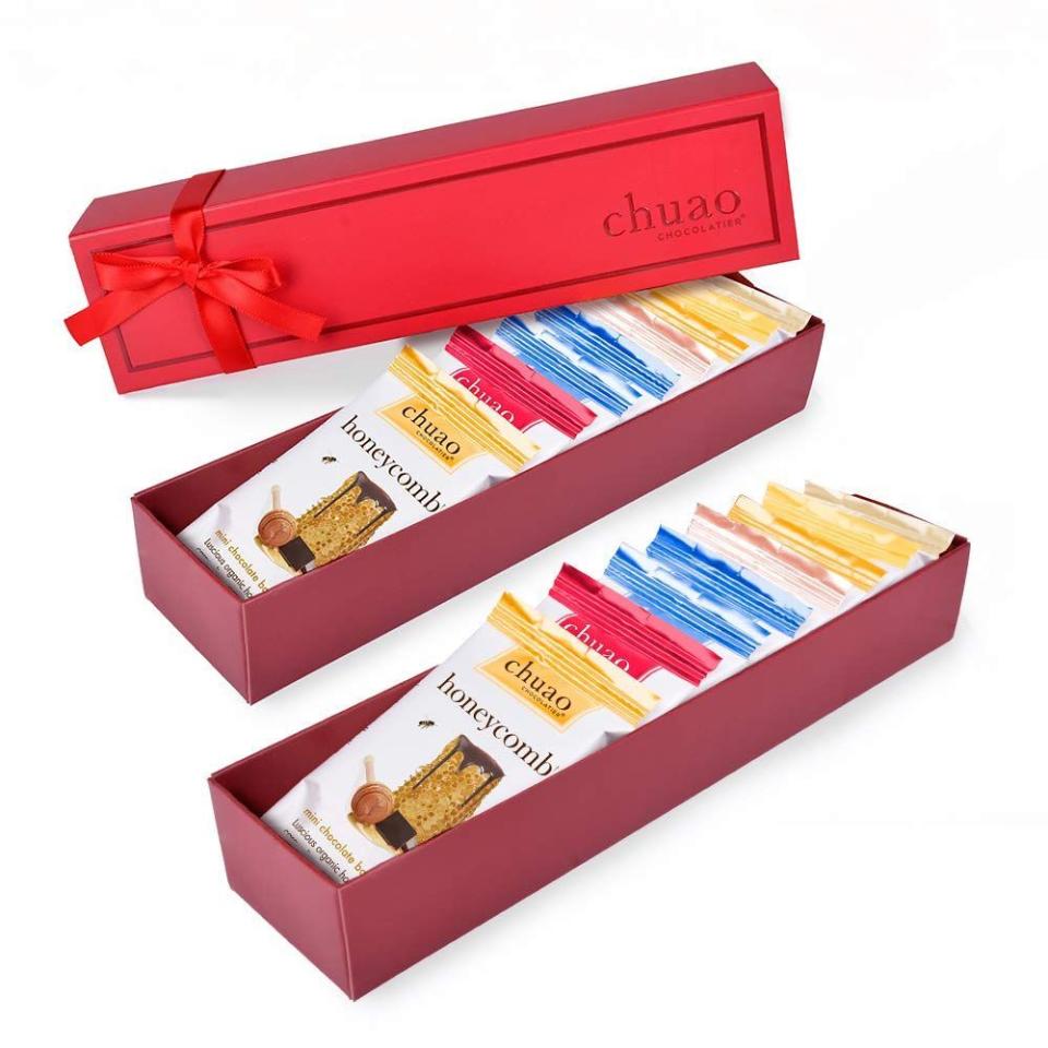 <p><strong>Chuao Chocolatier</strong></p><p>amazon.com</p><p><strong>$29.95</strong></p><p><a href="https://www.amazon.com/dp/B07GNWS9HK?tag=syn-yahoo-20&ascsubtag=%5Bartid%7C10051.g.13053688%5Bsrc%7Cyahoo-us" rel="nofollow noopener" target="_blank" data-ylk="slk:Shop Now;elm:context_link;itc:0" class="link ">Shop Now</a></p><p>This dark chocolate gift set from Whole Foods-carried brand Chuao Chocolatier contains innovative flavors the chocolate lover in your life simply won’t be expecting. Think: potato chip, honeycomb, salted chocolate crunch, and more. </p>