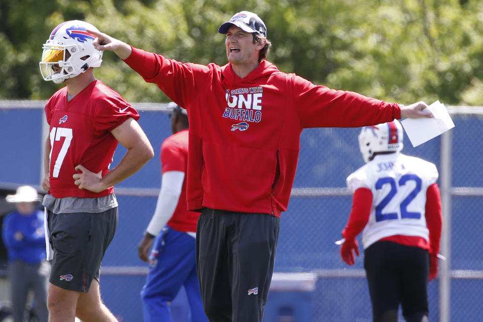 FILE - Buffalo Bills offensive coordinator Ken Dorsey directs players during NFL football practice in Orchard Park, N.Y., May 24, 2022. The Buffalo Bills fired offensive coordinator Ken Dorsey on Tuesday, Nov. 14, 2023, with the Josh Allen-led attack stagnating over a six-week stretch and the three-time defending AFC East champions falling further out of the playoff picture. (AP Photo/ Jeffrey T. Barnes, File)