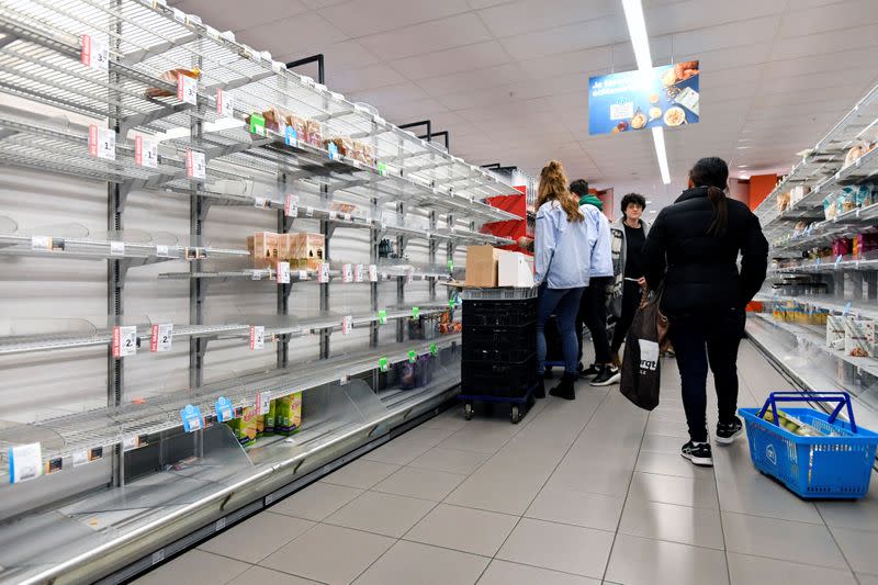 Empty shelves are seen at a supermarket in Amsterdam