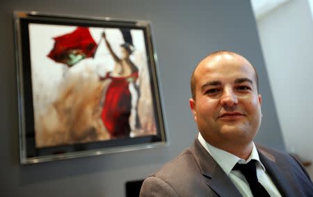 France's far-right National Front political party mayor of Frejus, David Rachline poses during an interview with Reuters in his office in Frejus, France, September 16, 2016. Picture taken September 16, 2016. To go with FRANCE-ELECTION/LEPEN REUTERS/Jean-Paul Pelissier