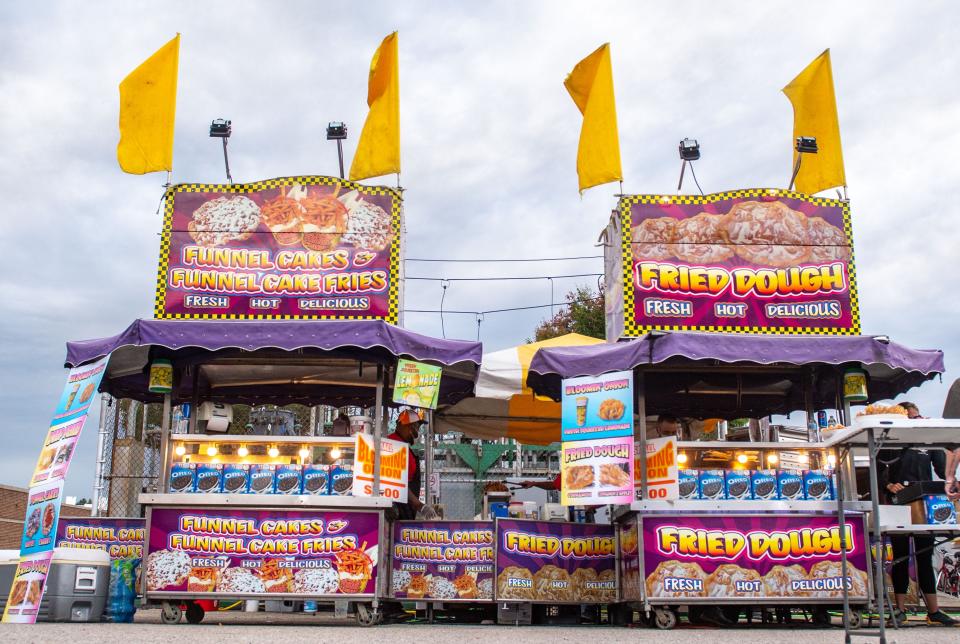 Food trucks sit on the York Fairgrounds offering a wide variety of refreshments and tasty treats during the York State Fair Food Festival in October 2020.