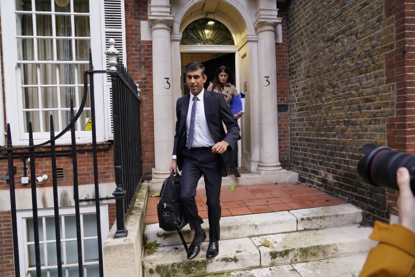 Conservative Party leadership candidate Rishi Sunak leaves the campaign office in London, Monday, Oct. 24, 2022. Former British Treasury chief Rishi Sunak is frontrunner in the Conservative Party's race to replace Liz Truss as prime minister. (AP Photo/Aberto Pezzali)