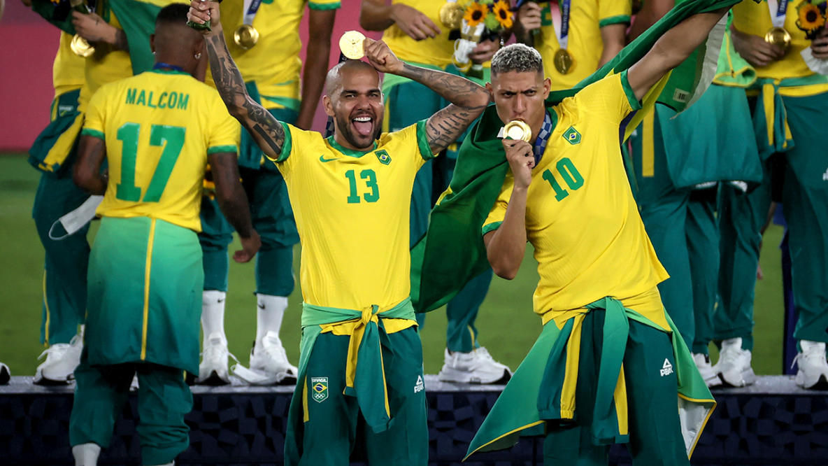 Soccer-Malcom grabs golden glory for Brazil