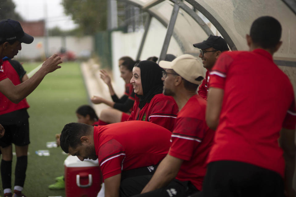Coaching staff of ASFAR soccer team interact during a match against ASDCT Ain Atiq, in Morocco's professional women league, in Rabat, Morocco, Wednesday, May 17, 2023. (AP Photo/Mosa'ab Elshamy)