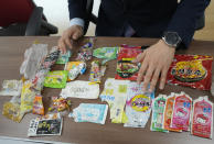 Kang Dong Wan, 48, a professor at South Korea's Dong-A University, displays trash from North Korea during an interview in Seoul, South Korea on April 4, 2022. Kang has turned to a different way of collecting information about secretive North Korea as pandemic restrictions make it harder for outsiders to find out what's life like for North Koreans. (AP Photo/Ahn Young-joon)