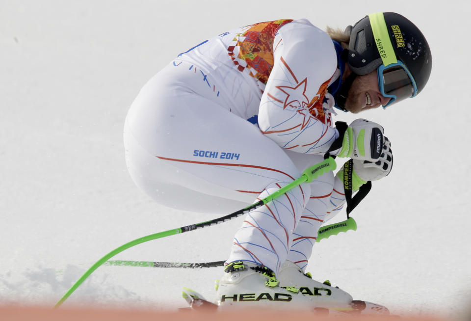 United States' Andrew Weibrecht comes to a halt at the end of his run in the men's super-G at the Sochi 2014 Winter Olympics, Sunday, Feb. 16, 2014, in Krasnaya Polyana, Russia.(AP Photo/Gero Breloer)