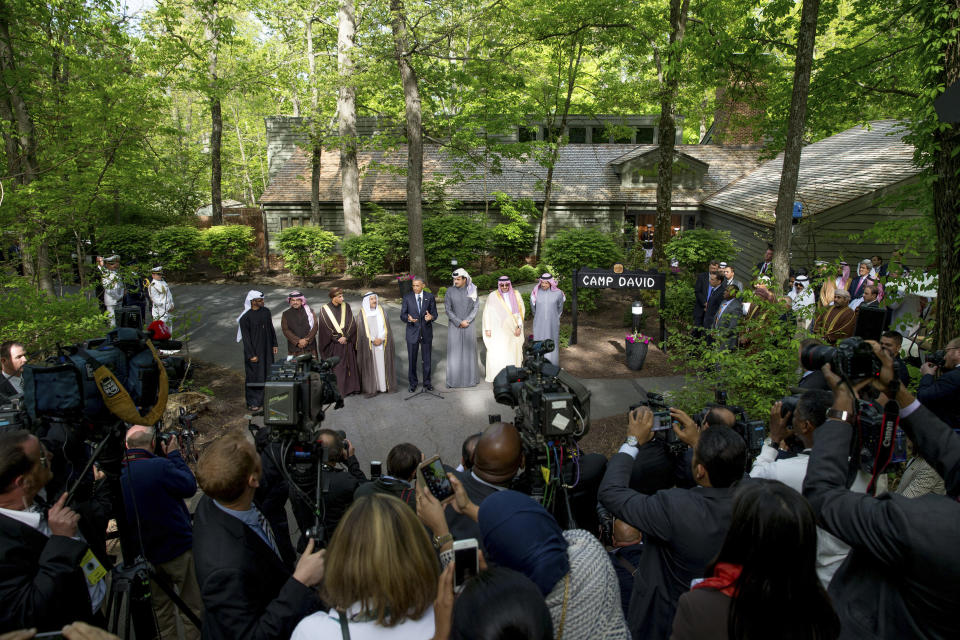 FILE - President Barack Obama stands with, from left, Abu Dhabi crown prince Sheik Mohammed bin Zayed Al Nahyan; Bahrain Crown Prince Prince Salman bin Hamad Al-Khalif; Deputy Prime Minister of Oman, Sayyid Fahad Bin Mahmood Al Said; Kuwait's Emir Sheik Sabah Al-Ahmad Al-Jaber Al-Sabah; Obama; Qatar's Emir Sheik Tamim bin Hamad Al-Thani; Saudi Arabia Crown Prince Mohammed bin Nayef; and Secretary General of the Gulf Cooperation Council, Abdul Latif Bin Rashid Al Zayani of Bahrain after meeting at Camp David in Maryland, May 14, 2015. (AP Photo/Andrew Harnik, File)