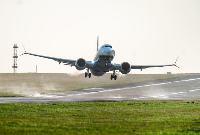 Plane taking off in wind