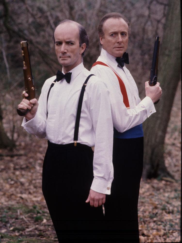Geoffrey Davies vpravo s Clivem Merrisonem ve filmu The Works of Erica, 1989.