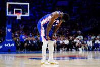 Philadelphia 76ers' Joel Embiid bows his head during the second half of Game 6 of an NBA basketball second-round playoff series against the Miami Heat, Thursday, May 12, 2022, in Philadelphia. (AP Photo/Matt Slocum)