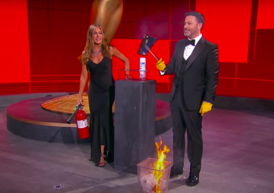 Jen holding a fire extinguisher