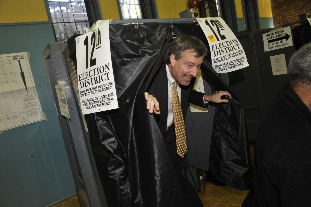 City Councilman Bill de Blasio, the Democratic candidate for Public Advocate, emerges from the voting booth after casting his ballot in the general election at Camp Friendship in Park Slope on November 3, 2009.