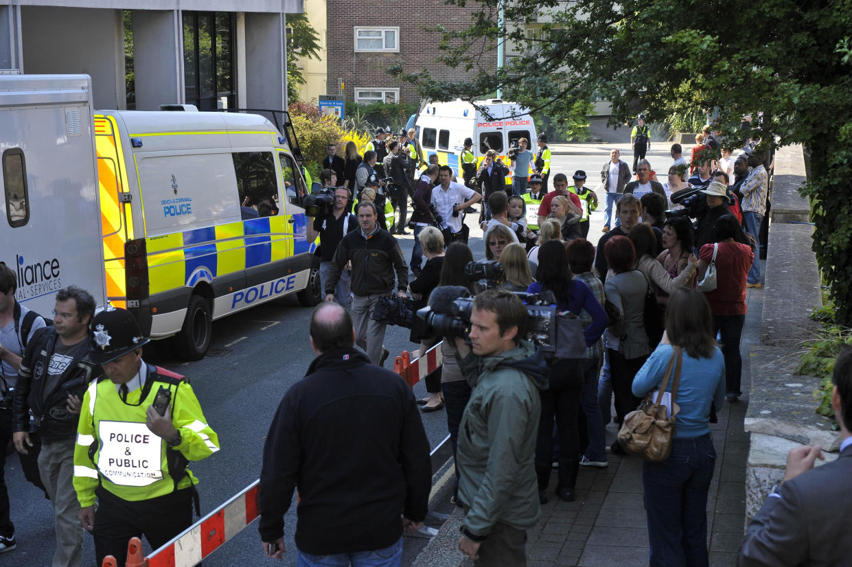 A crowd outside Plymouth Magistrates Court where Vanessa George appeared, charged with sexual assault and making and distributing child abuse images. George, 39, who worked at the Little Ted's nursery in Plymouth, was remanded in custody.