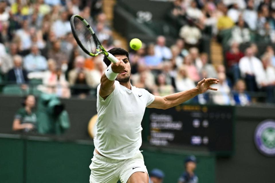 Carlos Alcaraz played out a remarkable match against Tommy Paul  (AFP via Getty Images)